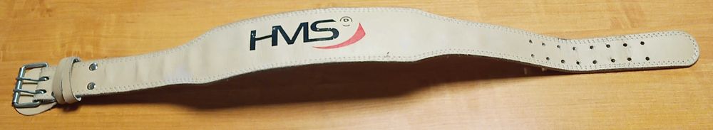 Solidny skórzany pas kulturystyczny HMS z metalową sprzączką.