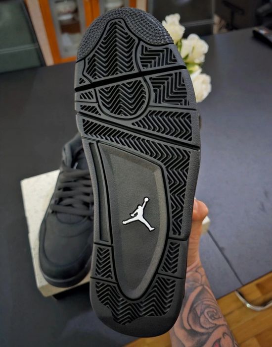 Jordan 4 RM Black Cat
