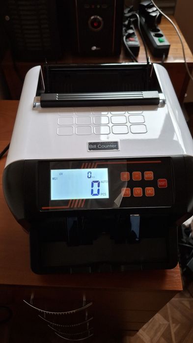 Машинка для підрахунку грошей