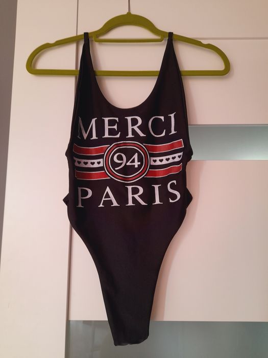 Strój kąpielowy body merci Paris nowy czarny stringi wycięty sexy 36 S
