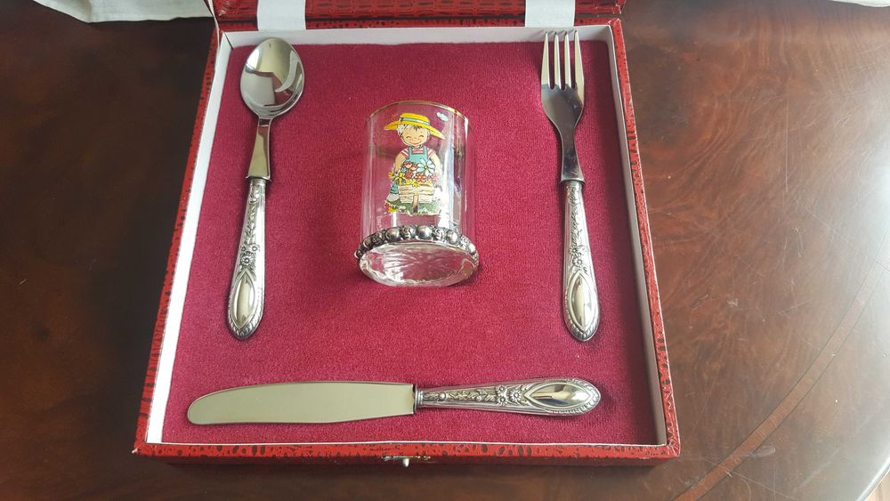 Complete cutlery set with silver handles and children's glass