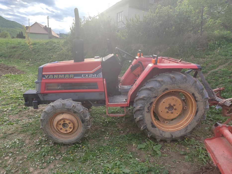 продам трактор янмар fx24d з усіма плугами і прицепом