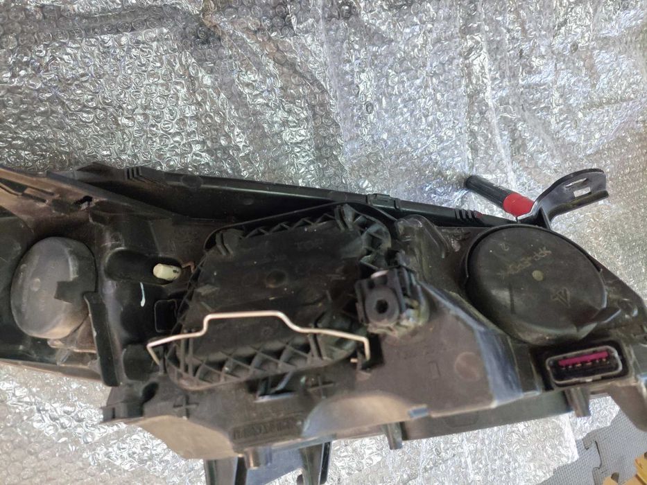 farol esq Renault megane 3