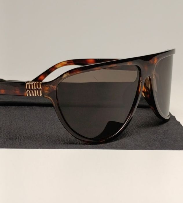 Маска от MIU MIU