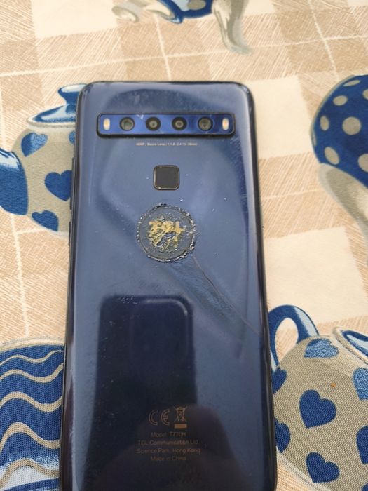TCL 70g usado pouco uso