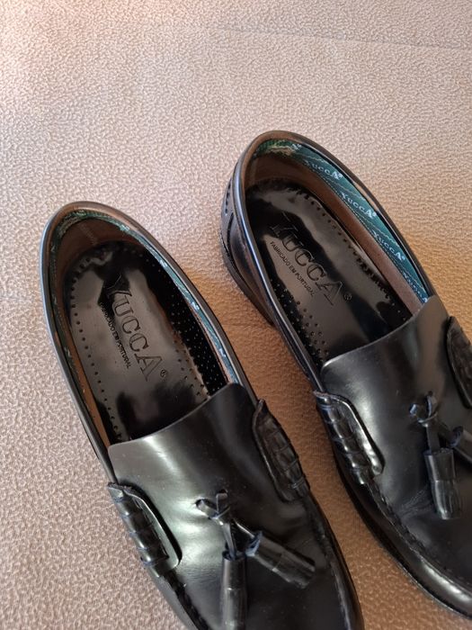 Sapatos clássicos em pele
