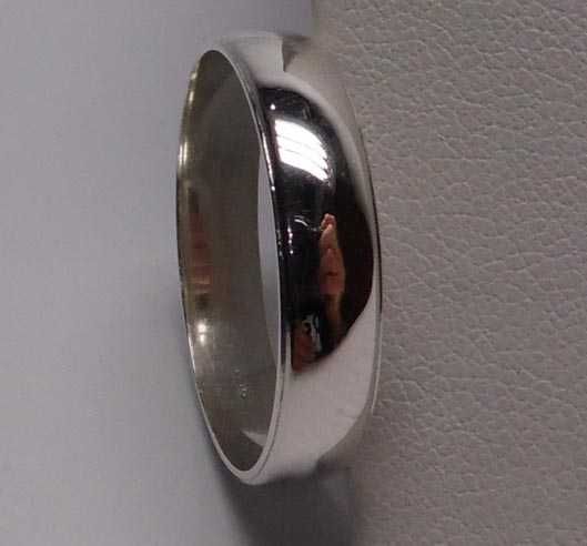 Srebrna gładka obrączka R.24 szerokość 4,8 mm.