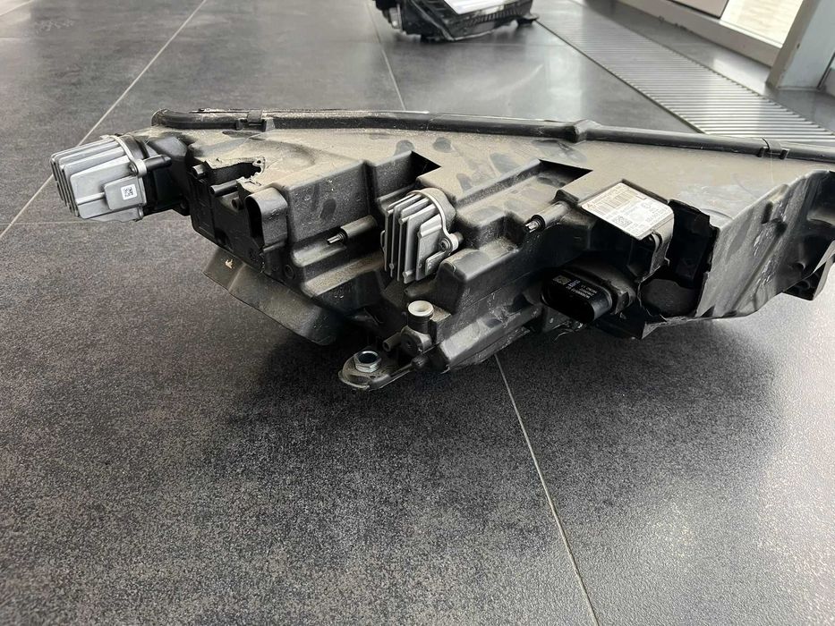 Lampa reflektor Skoda Octavia IV Lewa