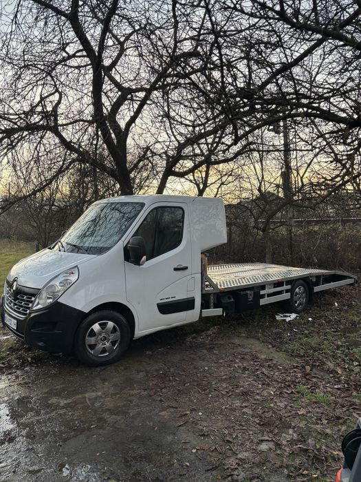 Послуги евакуатора, перевезення авто, мото, вантажі,допомога в дорозі