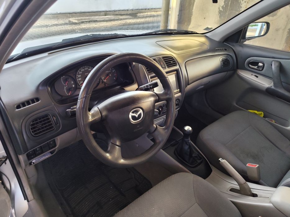 Mazda 323f 1.3 gasolina 2003