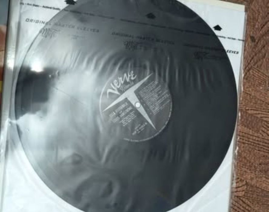 Ella Fitzgerald 
And Louis Armstrong 

Edição USA Época da Verve
  Hig