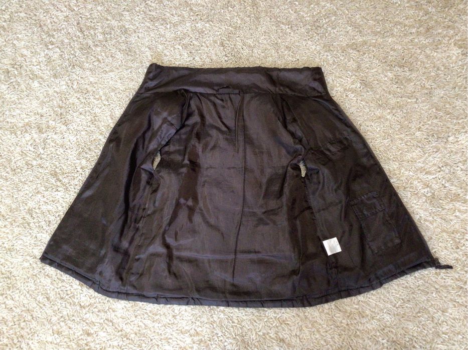 Жилетка теплая.