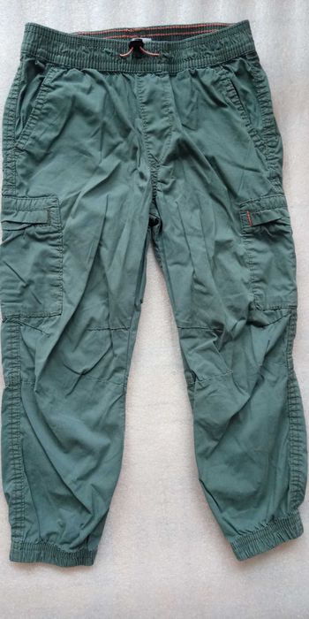 Spodnie H&M  przeciwdeszczowe rainwear chłopięce zielone rozmiar 110cm