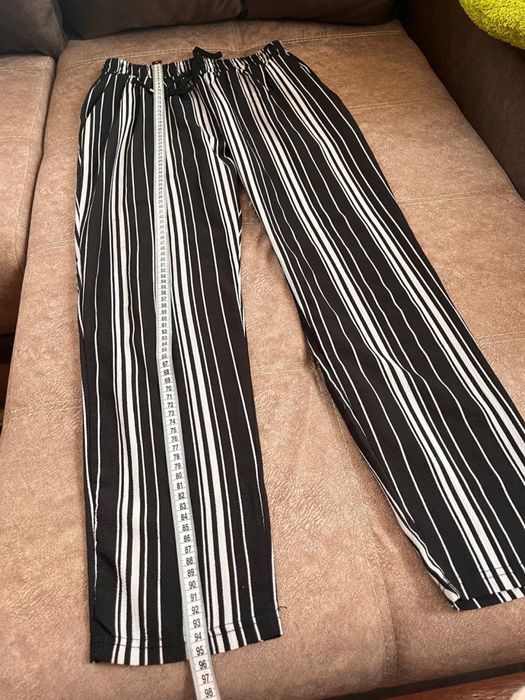 штани в смужку L