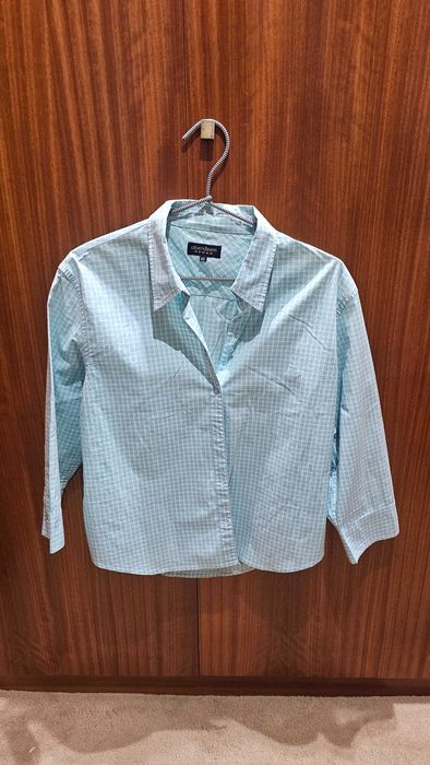 Camisa manga três quartos