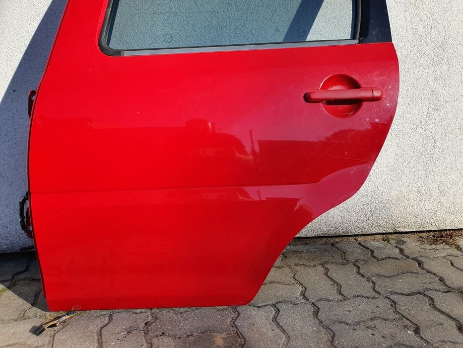 Daihatsu YRV M2 drzwi lewy tył tylne lewe kompletne
