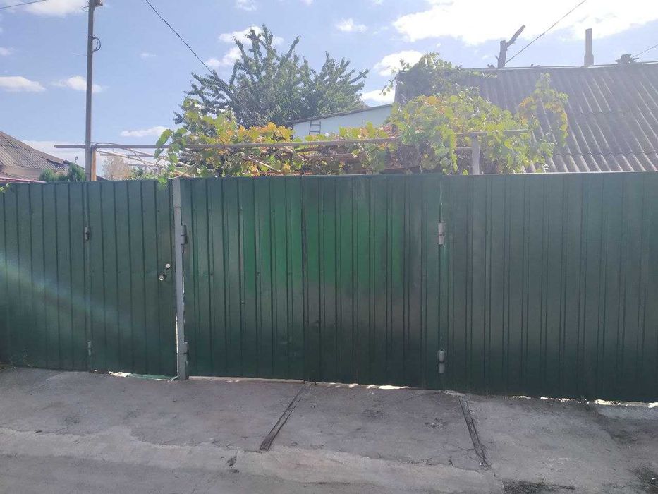 Продажа дома в общем дворе.