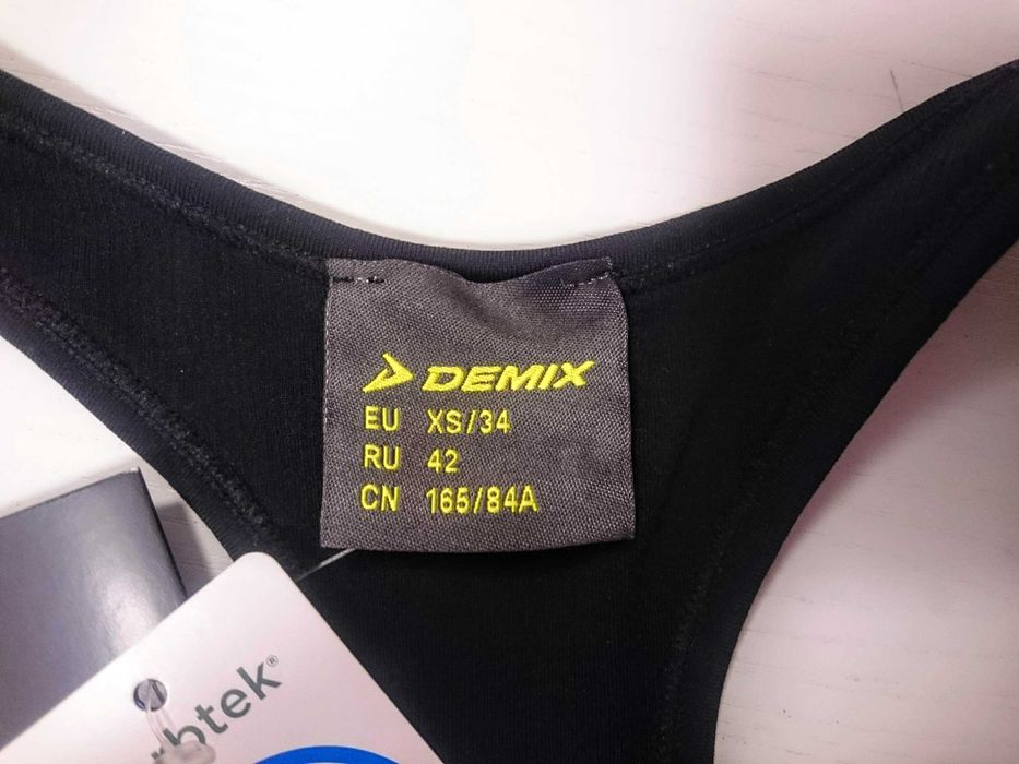 Новий спортивний еластичний жіночий топ Demix, розмір 34 / XS / 42