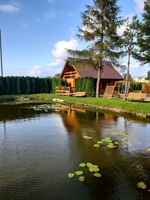 Domki nad stawem sauna jacuzzi