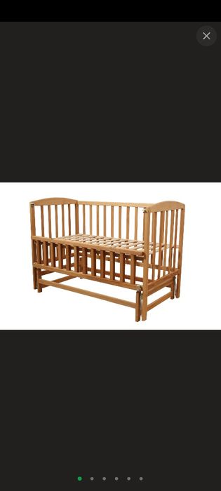 Дитяче ліжечко-маятник