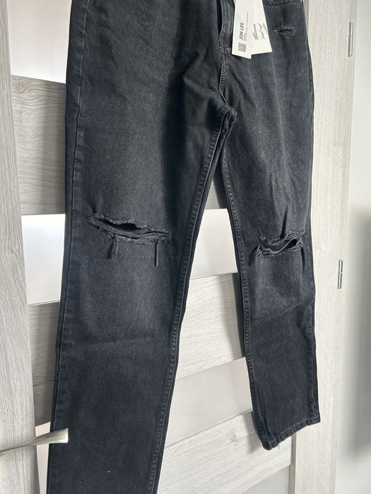 Spodnie jeansowe z przetarciami zara m