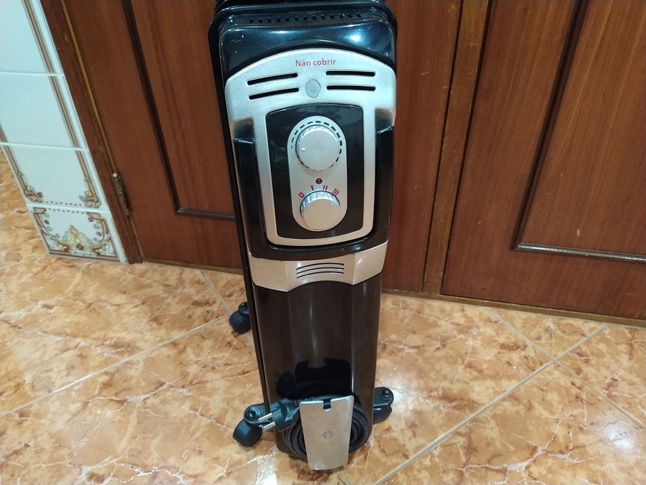 Aquecedor radiador a óleo casa quarto apartamento vivenda escritório gabinete cozinha.
