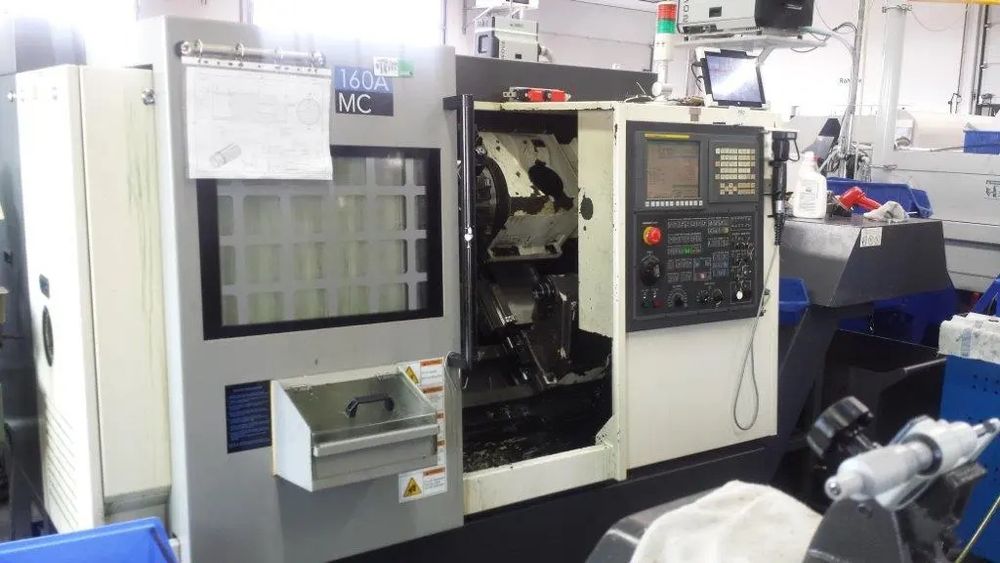 Токарный  центр станок с ЧПУ  контршпинделем   Hwacheon Cutex 160A MC