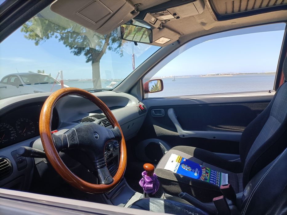 Volante Momo Madeira Fiat Punto + buzinas universais