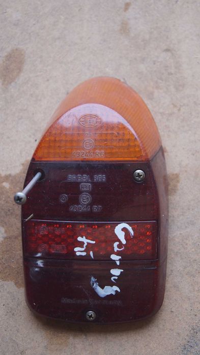 VW Garbus 1967- Klosz lampy tylnej trzykolorowy oryginał sygnowany