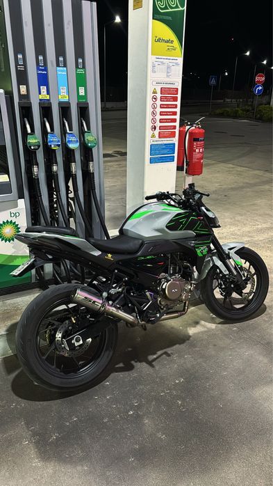 KL duel 125cc com escape feito a mao