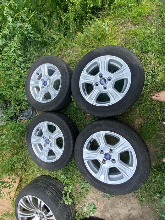 Alufelgi orginalne Ford 15-4x108 z oponami letnimi continental