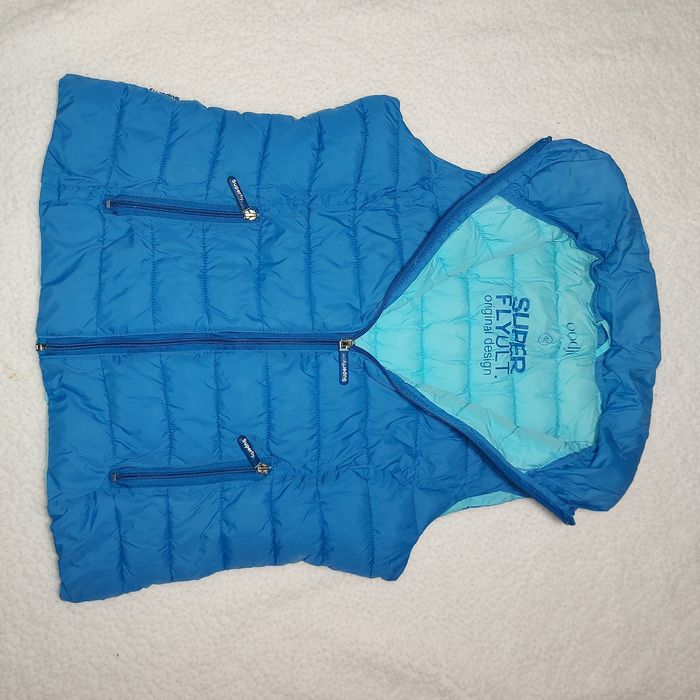 Жилетка на пуху,теплая