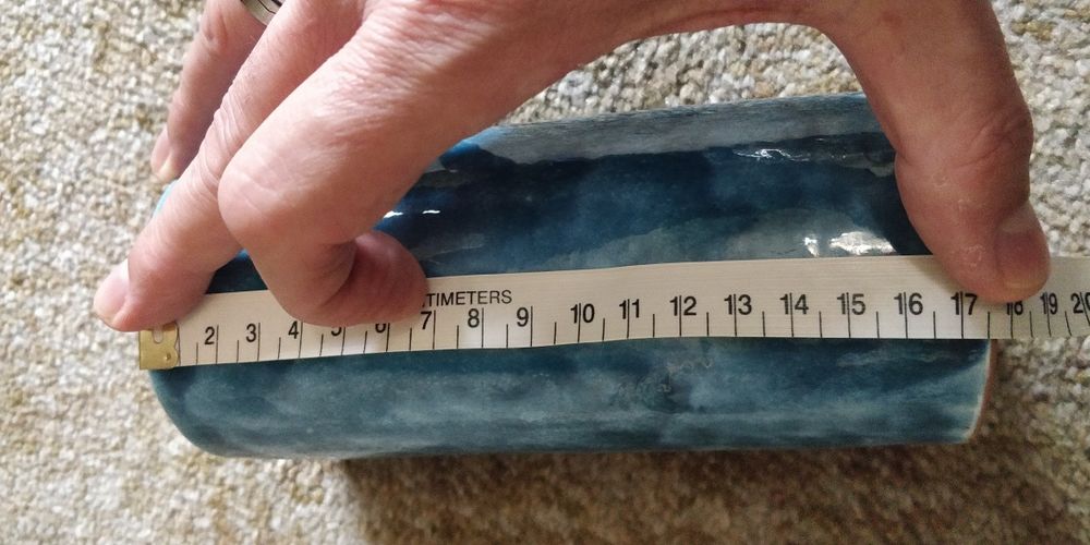 Blue-toned ceramic jug427809196946892803