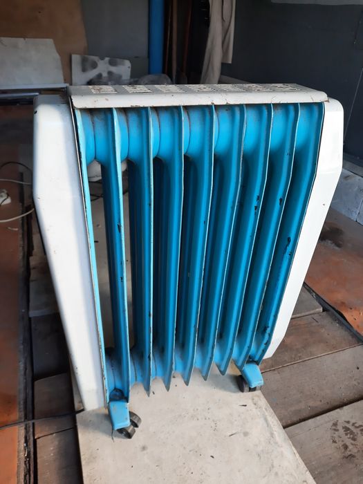 Масляный обогреватель,  рабочее состояние