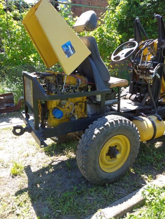 Повнокерований міні погрузчик