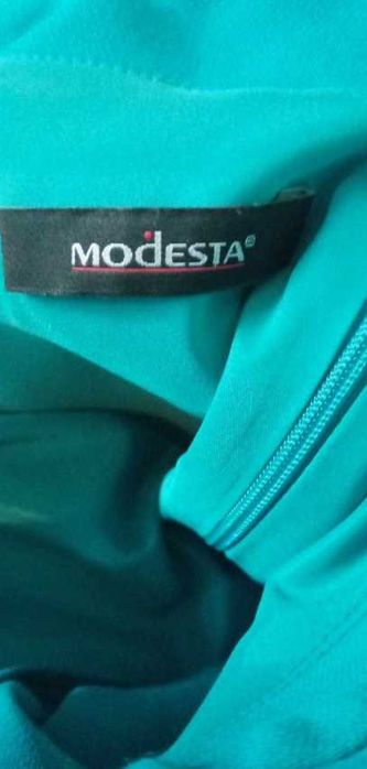 Elegancka sukienka niebieska modesta