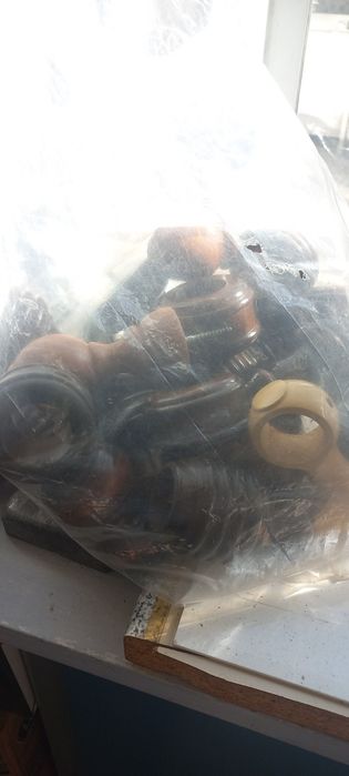 Ponteiras de varão e suportes de cortinados  de madeira