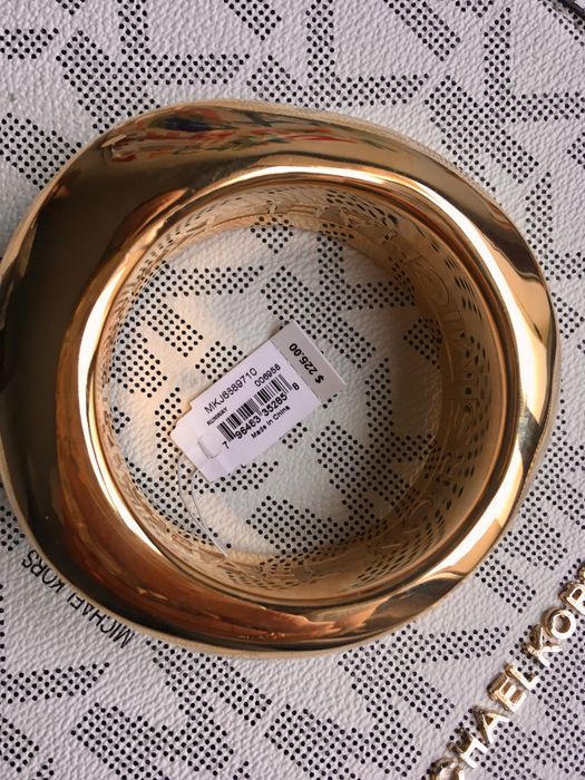 Złota, gruba bransoleta Micheal Kors