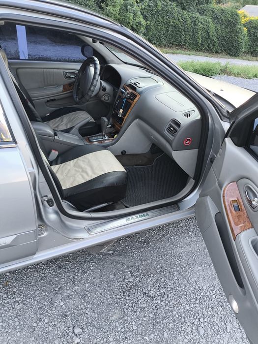 Nissan Maxima 2002 VIN JN1CCUA33U0090530 фото оголошення 8 з 10
