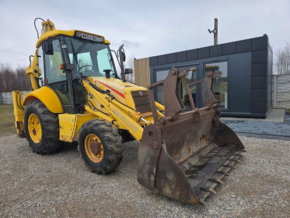 New Holland  New Holland 110 - TYLKO 9258 H- 2003 rok- cena: 83.000 + vat jcb cat