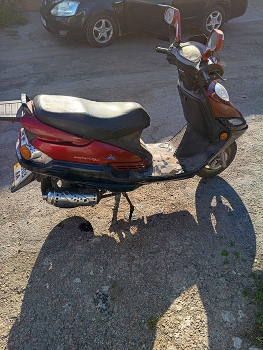 Скутер 125кубов.