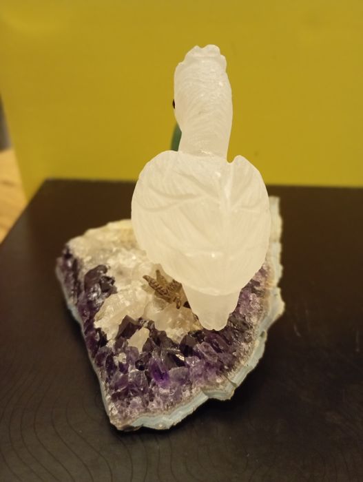 Par de figuras decorativas em pedra natural sobre ametista