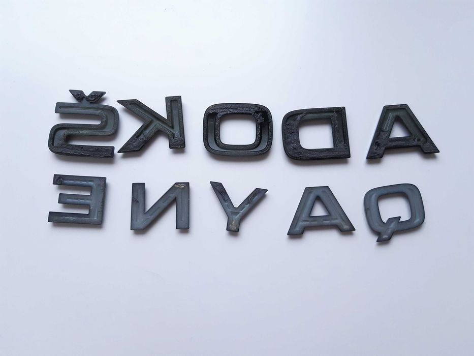 Emblemat / logo / napis SKODA ENYAQ - 2023r.
