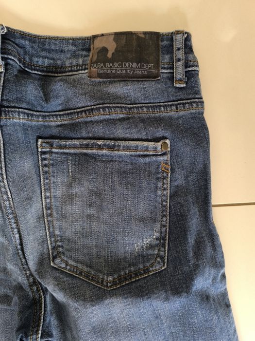 Spodnie z dziurami, jeansy damskie Zara 38