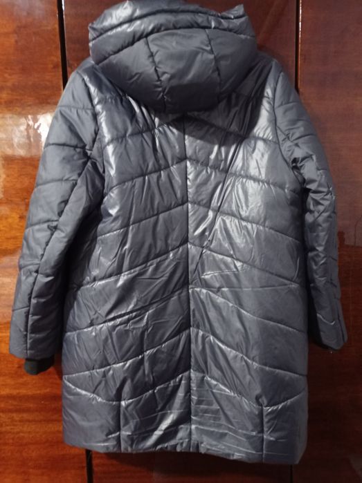 Зимова тепла куртка 50 р.