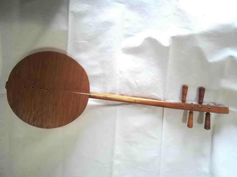 Réplica de instrumento para decoração