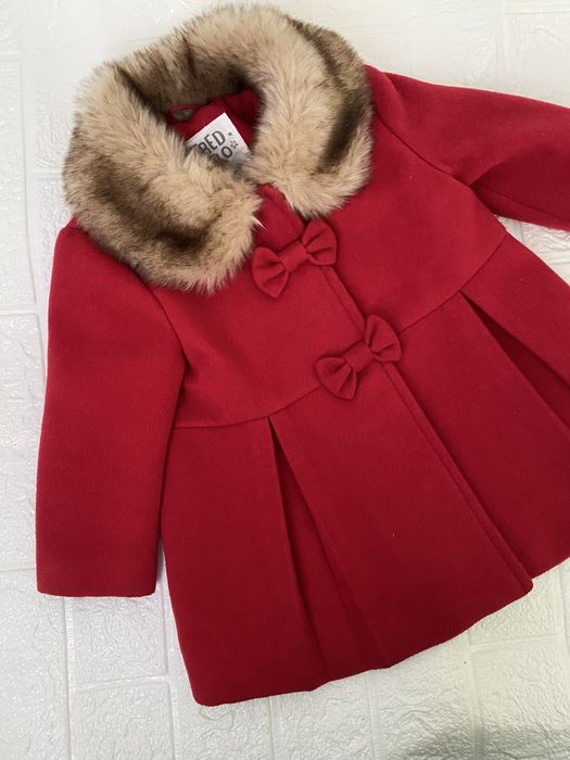 Стильне пальто.