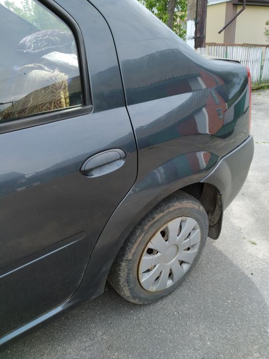 Автомобиль Дача Логан.