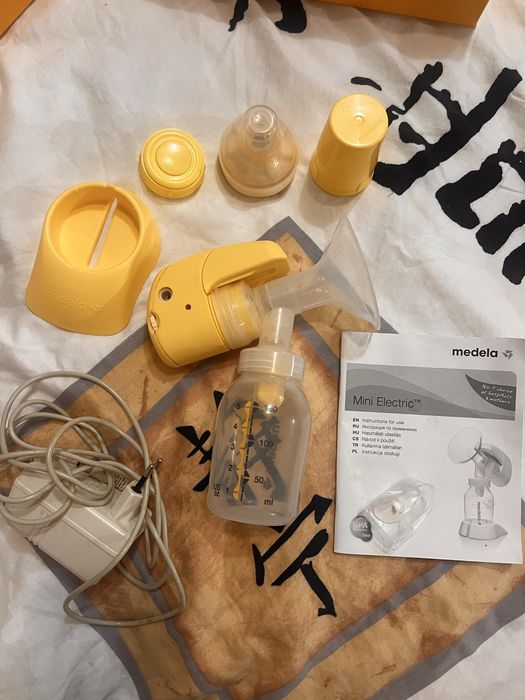 Молоковідсмоктувач автоматичний Medela+ пляшки