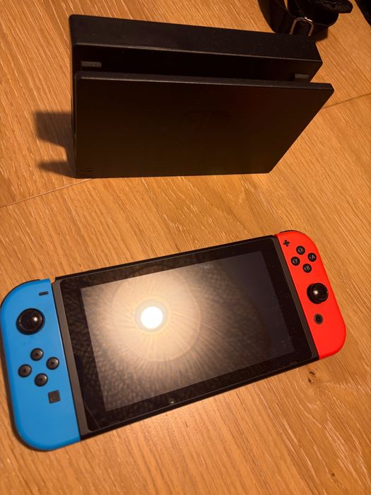 Nintendo Switch Azul/Vermelho + Bolsa Animal Crossing + Grip Joy-Con + Fatura